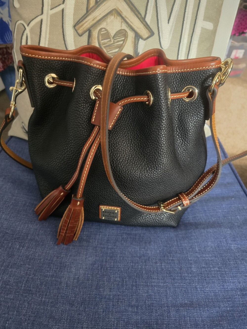 Dooney & Bourke Black Pebble Leather Drawstring Bucket Bag with Brown Trim